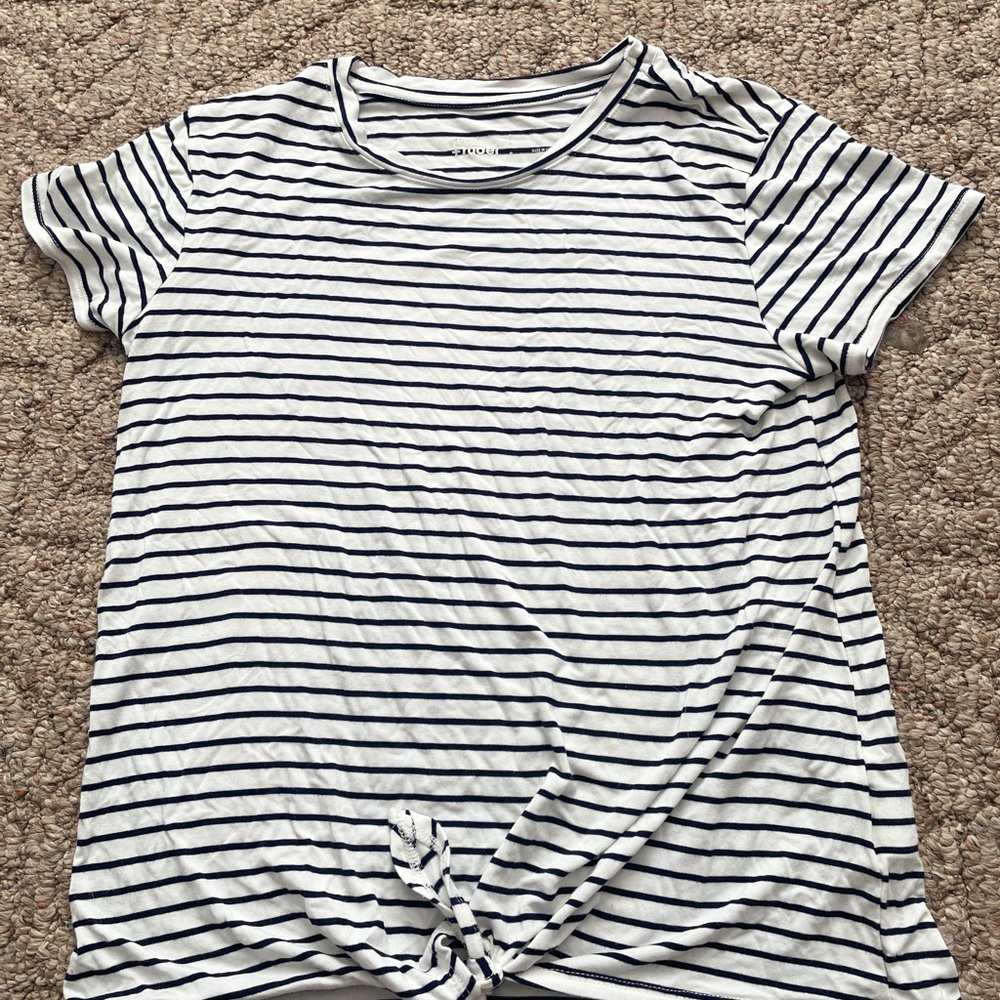 Girls navy blue/white striped T-shirt with not on the bottom.